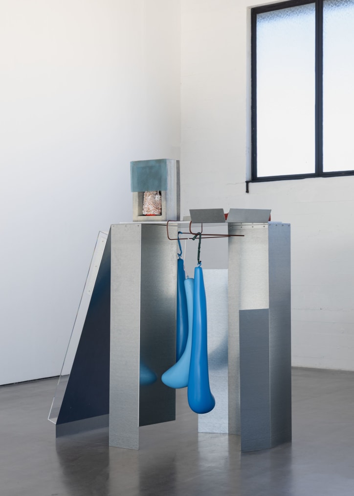 Nairy Baghramian sculpture with galvanized metal panels and hanging blue blob forms, photo by Eline Willaert